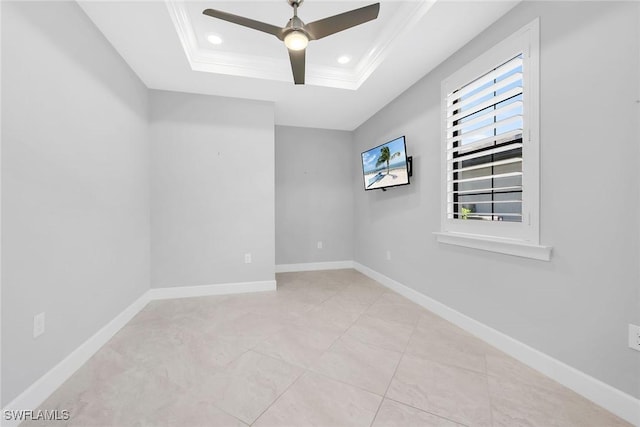 7690 Jacaranda Ln, Naples, FL 34114 - empty room with ceiling fan, a raised ceiling, ornamental molding, and recessed lighting
