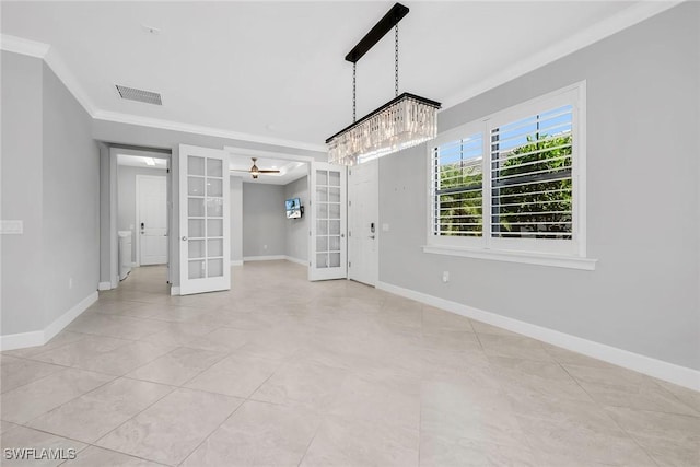 7690 Jacaranda Ln, Naples, FL 34114 - empty room with french doors, crown molding, light tile patterned floors, and a chandelier