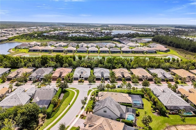 7690 Jacaranda Ln, Naples, FL 34114 - aerial view of residential area featuring a large body of water
