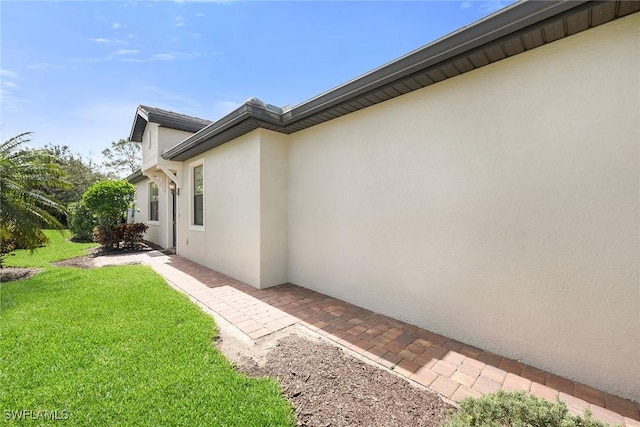 7690 Jacaranda Ln, Naples, FL 34114 - view of green lawn