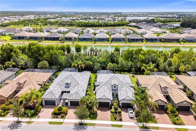7690 Jacaranda Ln, Naples, FL 34114 - aerial view of residential area with a nearby body of water
