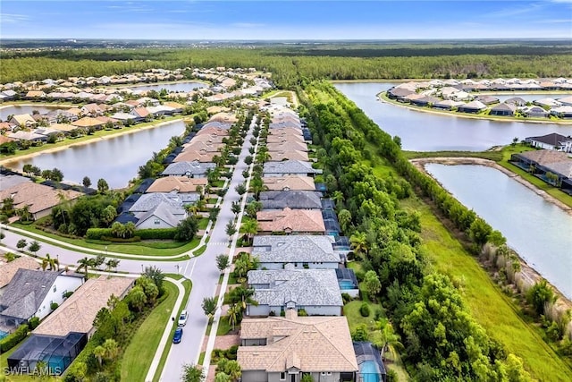 7690 Jacaranda Ln, Naples, FL 34114 - aerial view of residential area featuring a large body of water
