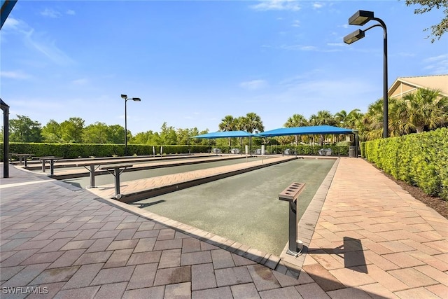 7690 Jacaranda Ln, Naples, FL 34114 - view of property's community featuring a game area