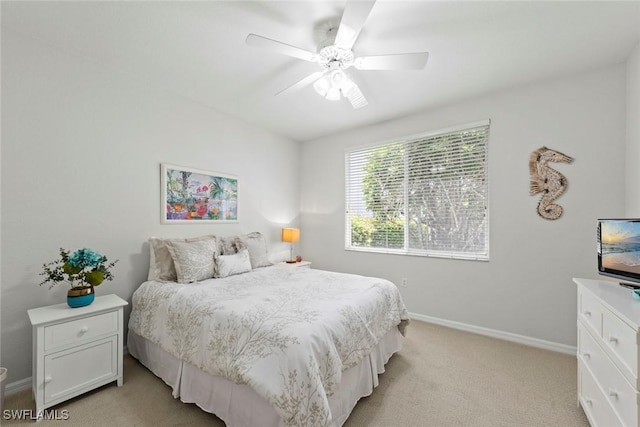 8421 Southbridge Dr Unit 4, Estero, FL 33967 - bedroom featuring light carpet and a ceiling fan