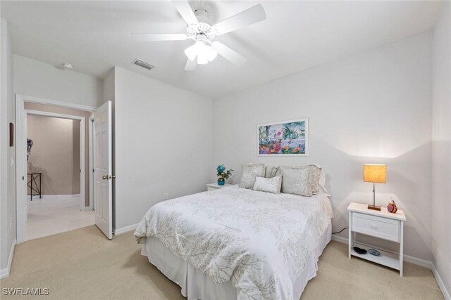 8421 Southbridge Dr Unit 4, Estero, FL 33967 - bedroom with light colored carpet and ceiling fan