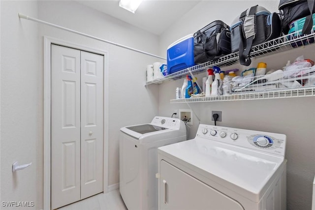 8421 Southbridge Dr Unit 4, Estero, FL 33967 - laundry room featuring washer and dryer