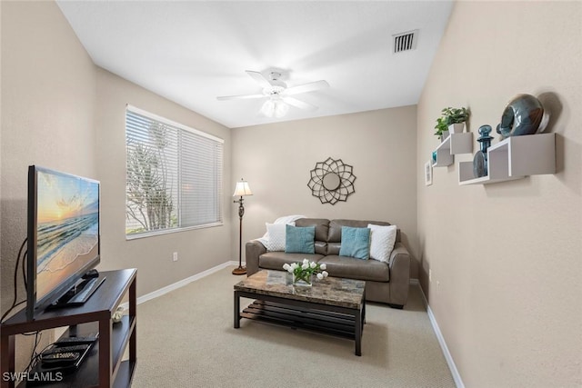8421 Southbridge Dr Unit 4, Estero, FL 33967 - living area with ceiling fan and carpet flooring