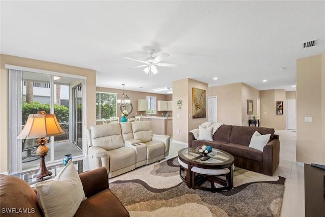 8421 Southbridge Dr Unit 4, Estero, FL 33967 - living room with a ceiling fan, a chandelier, and recessed lighting