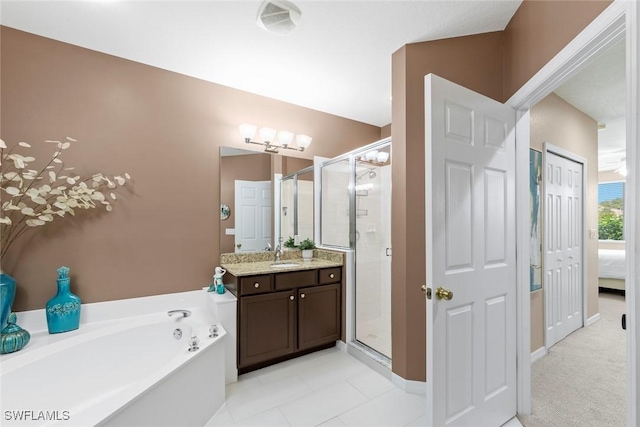 8421 Southbridge Dr Unit 4, Estero, FL 33967 - bathroom with ensuite bath, vanity, a stall shower, and a garden tub