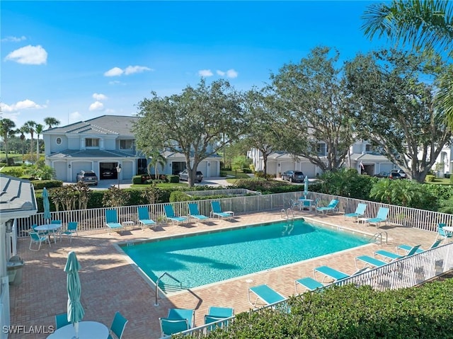 8421 Southbridge Dr Unit 4, Estero, FL 33967 - community pool featuring a patio and a residential view