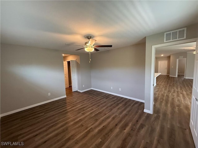 19474 Strathcona Ave, Port Charlotte, FL 33954 - unfurnished room with a ceiling fan and dark wood-type flooring