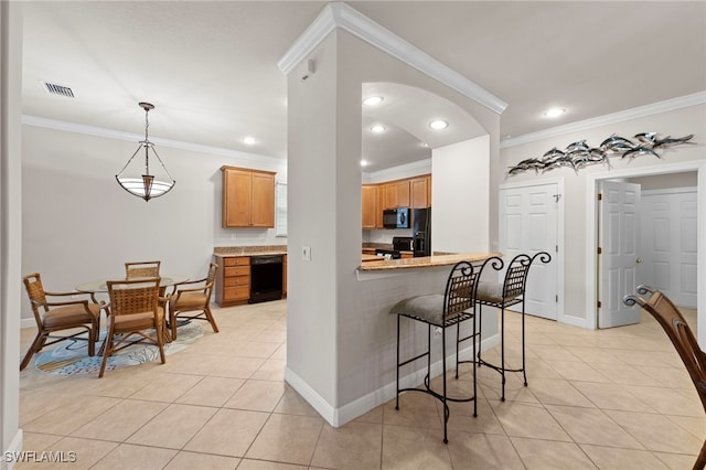 28649 San Lucas Ln Unit 102, Bonita Springs, FL 34135 - kitchen featuring black appliances, light tile patterned flooring, crown molding, a kitchen breakfast bar, and recessed lighting