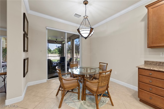 28649 San Lucas Ln Unit 102, Bonita Springs, FL 34135 - dining room with ornamental molding and light tile patterned floors