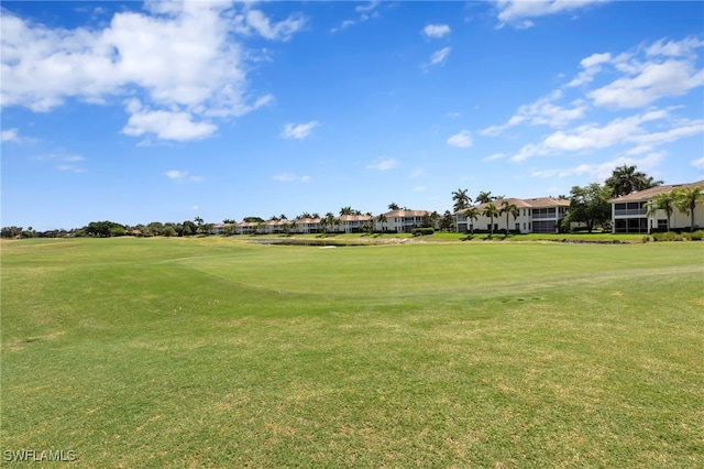 28649 San Lucas Ln Unit 102, Bonita Springs, FL 34135 - surrounding community featuring golf course view, a residential view, and a yard