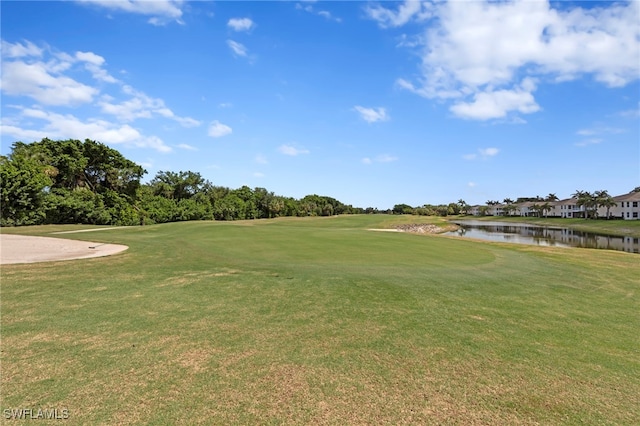 28649 San Lucas Ln Unit 102, Bonita Springs, FL 34135 - surrounding community featuring a water view, view of golf course, and a yard