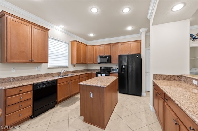 28649 San Lucas Ln Unit 102, Bonita Springs, FL 34135 - kitchen featuring black appliances, brown cabinets, light stone countertops, crown molding, and a kitchen island