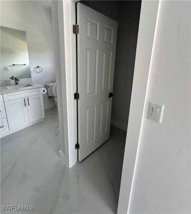 821 Bell Blvd S, Lehigh Acres, FL 33974 - bathroom with vanity and marble look tiles