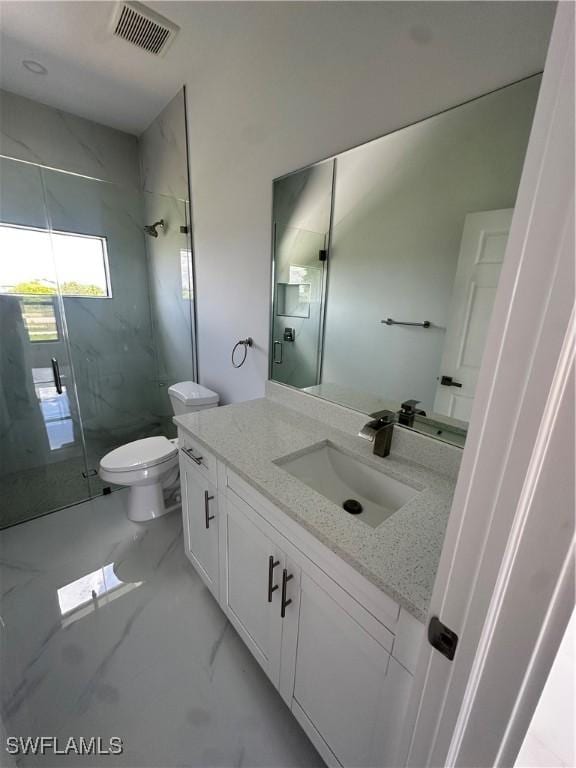 821 Bell Blvd S, Lehigh Acres, FL 33974 - full bathroom featuring a marble finish shower, vanity, and marble finish flooring