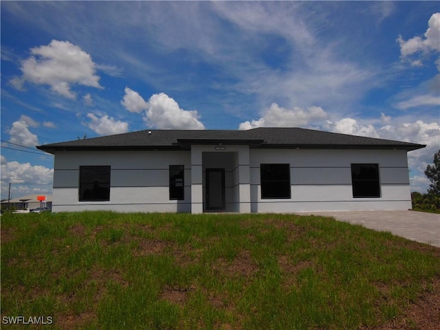 821 Bell Blvd S, Lehigh Acres, FL 33974 - view of front facade with stucco siding