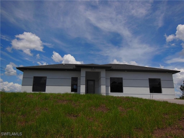 821 Bell Blvd S, Lehigh Acres, FL 33974 - view of front of property with stucco siding