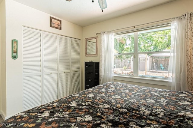 1413 Davis Dr, Fort Myers, FL 33919 - bedroom with a closet and ceiling fan