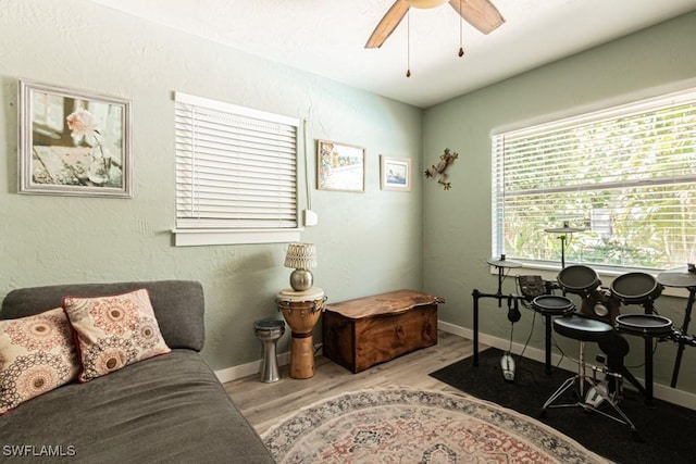 1413 Davis Dr, Fort Myers, FL 33919 - home office with wood finished floors and a ceiling fan