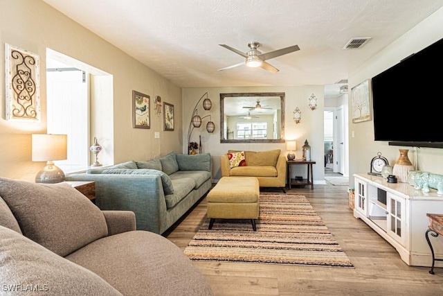 1413 Davis Dr, Fort Myers, FL 33919 - living area with a ceiling fan and light wood finished floors