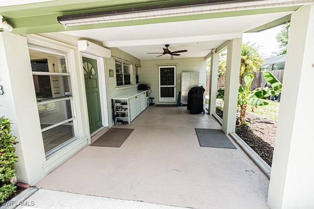 1413 Davis Dr, Fort Myers, FL 33919 - view of patio featuring a wall mounted air conditioner and a ceiling fan