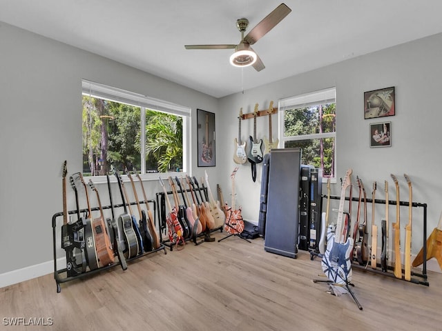 3475 3rd Ave SW, Naples, FL 34117 - playroom featuring wood finished floors, a ceiling fan, and plenty of natural light