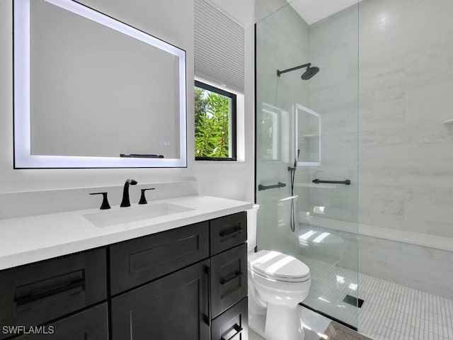 3475 3rd Ave SW, Naples, FL 34117 - bathroom with vanity, tiled shower, and tile patterned floors