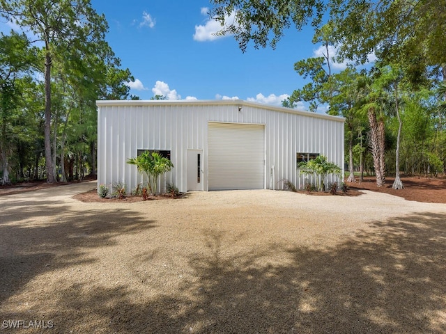 3475 3rd Ave SW, Naples, FL 34117 - detached garage featuring driveway