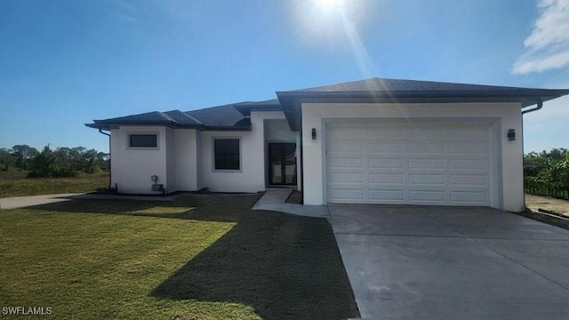 1024 Halby Ave S, Lehigh Acres, FL 33974 - view of front of house featuring stucco siding, driveway, an attached garage, and a front lawn