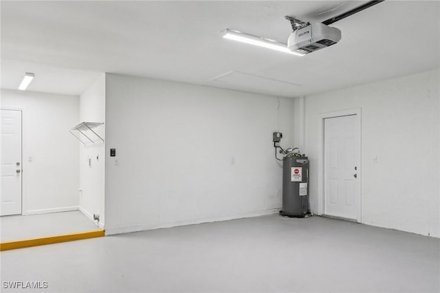 740 SW 5th St, Cape Coral, FL 33991 - garage featuring a garage door opener and water heater
