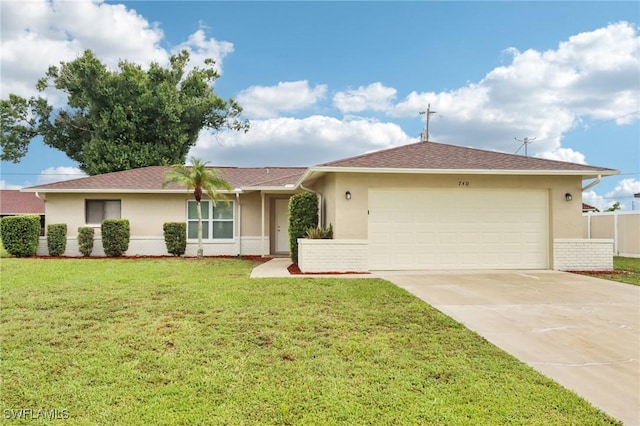 740 SW 5th St, Cape Coral, FL 33991 - single story home featuring stucco siding, driveway, and an attached garage