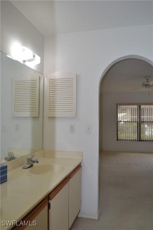 4241 Chantelle Dr Unit D102, Naples, FL 34112 - bathroom with vanity and a ceiling fan