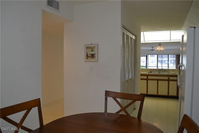 4241 Chantelle Dr Unit D102, Naples, FL 34112 - dining room with a chandelier