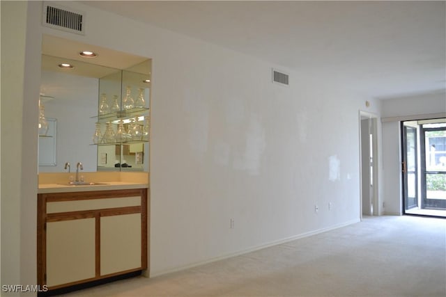 4241 Chantelle Dr Unit D102, Naples, FL 34112 - indoor wet bar featuring light carpet