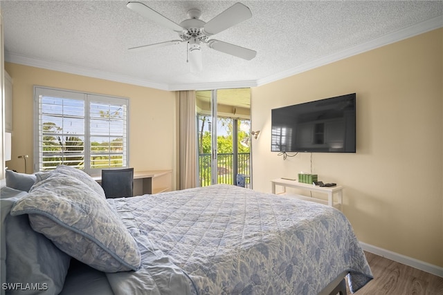 415 Augusta Blvd Unit 310, Naples, FL 34113 - bedroom featuring access to exterior, crown molding, wood finished floors, a textured ceiling, and ceiling fan