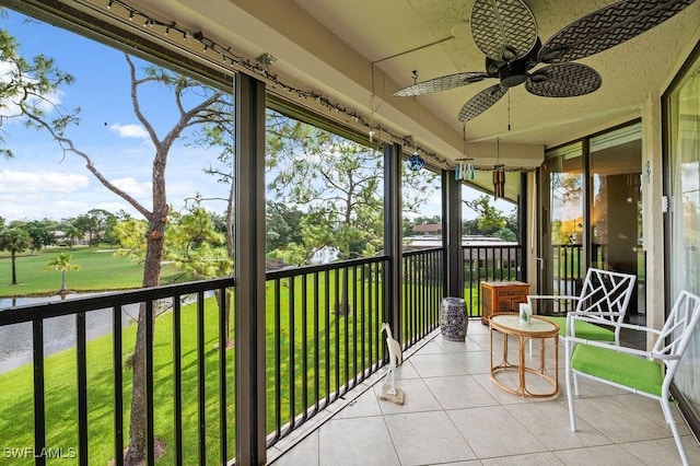 415 Augusta Blvd Unit 310, Naples, FL 34113 - sunroom featuring ceiling fan