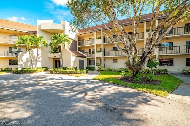 415 Augusta Blvd Unit 310, Naples, FL 34113 - view of apartment building / complex
