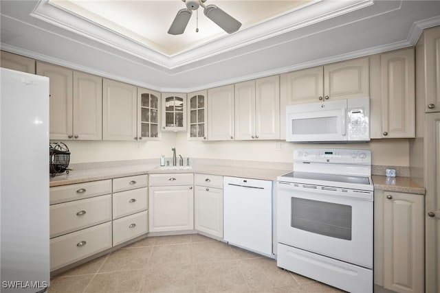 415 Augusta Blvd Unit 310, Naples, FL 34113 - kitchen with white appliances, ceiling fan, light countertops, glass insert cabinets, and cream cabinets