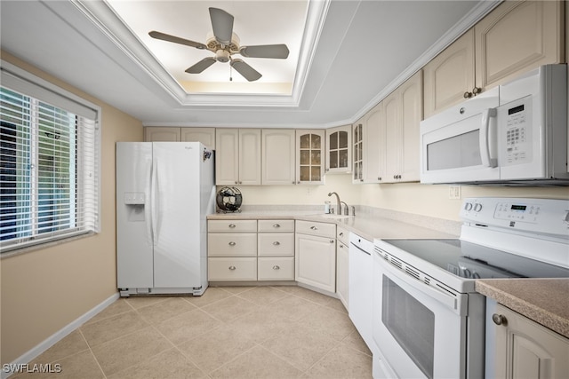 415 Augusta Blvd Unit 310, Naples, FL 34113 - kitchen featuring white appliances, a tray ceiling, cream cabinetry, ceiling fan, and glass insert cabinets
