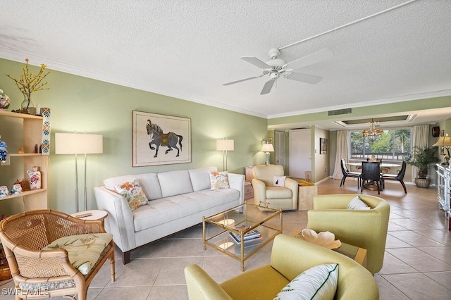 415 Augusta Blvd Unit 310, Naples, FL 34113 - living area with ornamental molding, tile patterned flooring, a ceiling fan, and a textured ceiling