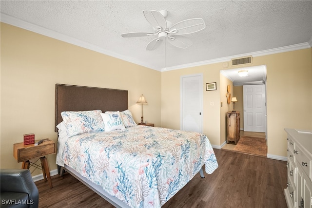 415 Augusta Blvd Unit 310, Naples, FL 34113 - bedroom with dark wood-style floors, ornamental molding, a textured ceiling, and ceiling fan