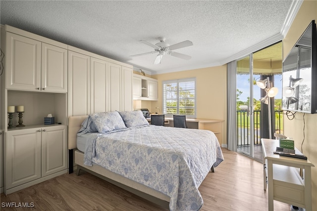 415 Augusta Blvd Unit 310, Naples, FL 34113 - bedroom with crown molding, access to outside, light wood finished floors, a textured ceiling, and a ceiling fan