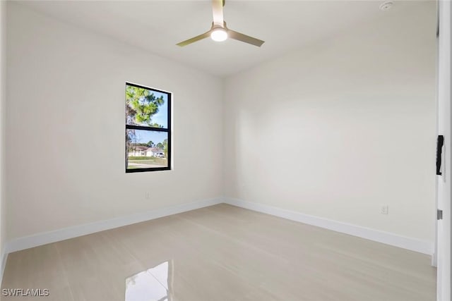 3115 41st St SW, Lehigh Acres, FL 33976 - unfurnished room featuring a ceiling fan and a smoke detector