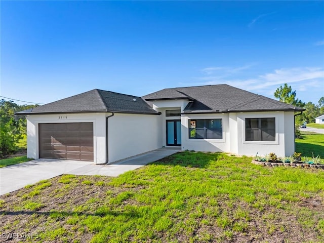 3115 41st St SW, Lehigh Acres, FL 33976 - view of front of house featuring a garage, driveway, a front yard, stucco siding, and roof with shingles