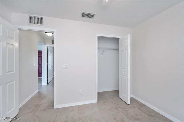 806 SW 4th Ave, Cape Coral, FL 33991 - unfurnished bedroom with a closet and baseboards