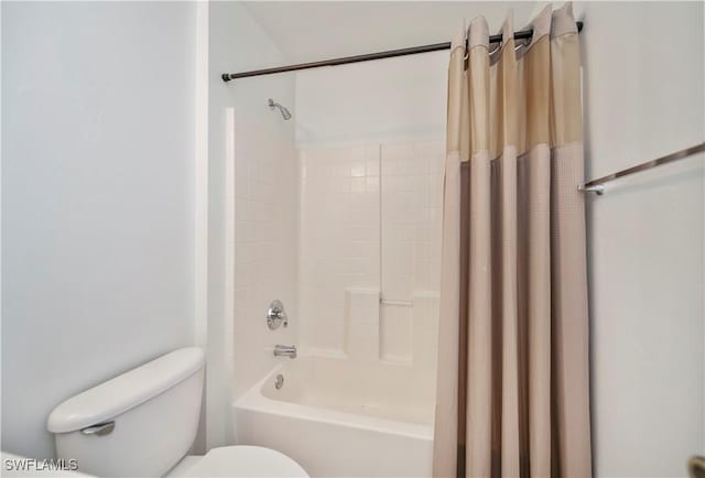 806 SW 4th Ave, Cape Coral, FL 33991 - bathroom with shower / bathtub combination with curtain and toilet