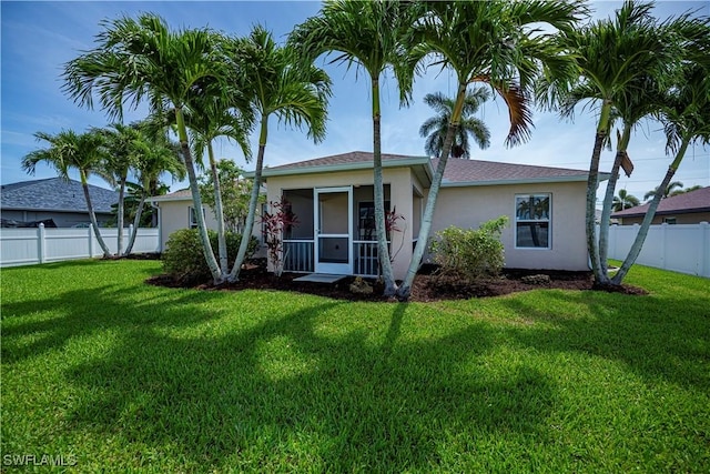 806 SW 4th Ave, Cape Coral, FL 33991 - ranch-style house with stucco siding and a sunroom